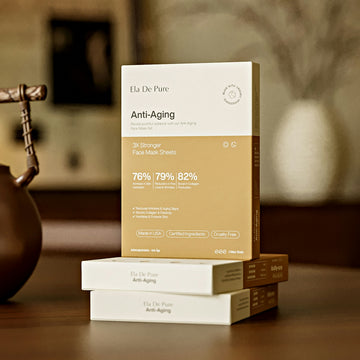 Anti-aging face mask sheets are stacked on a table